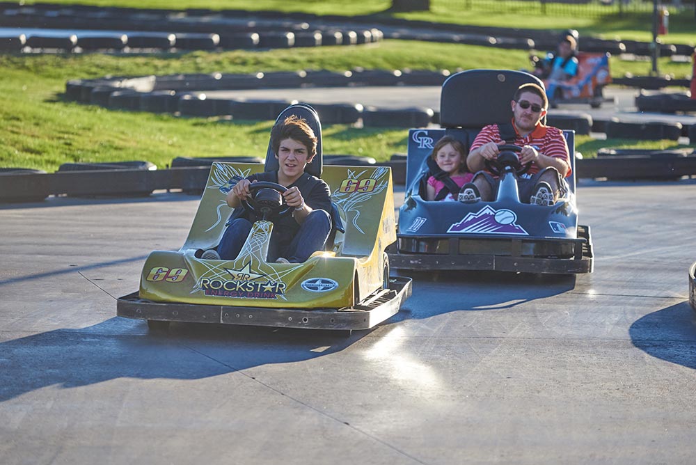 guests riding go karts